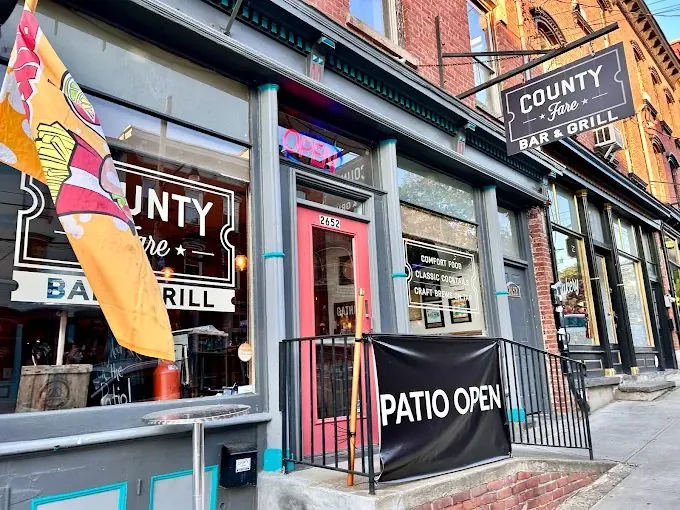 Country bar and grill storefront with the patio open