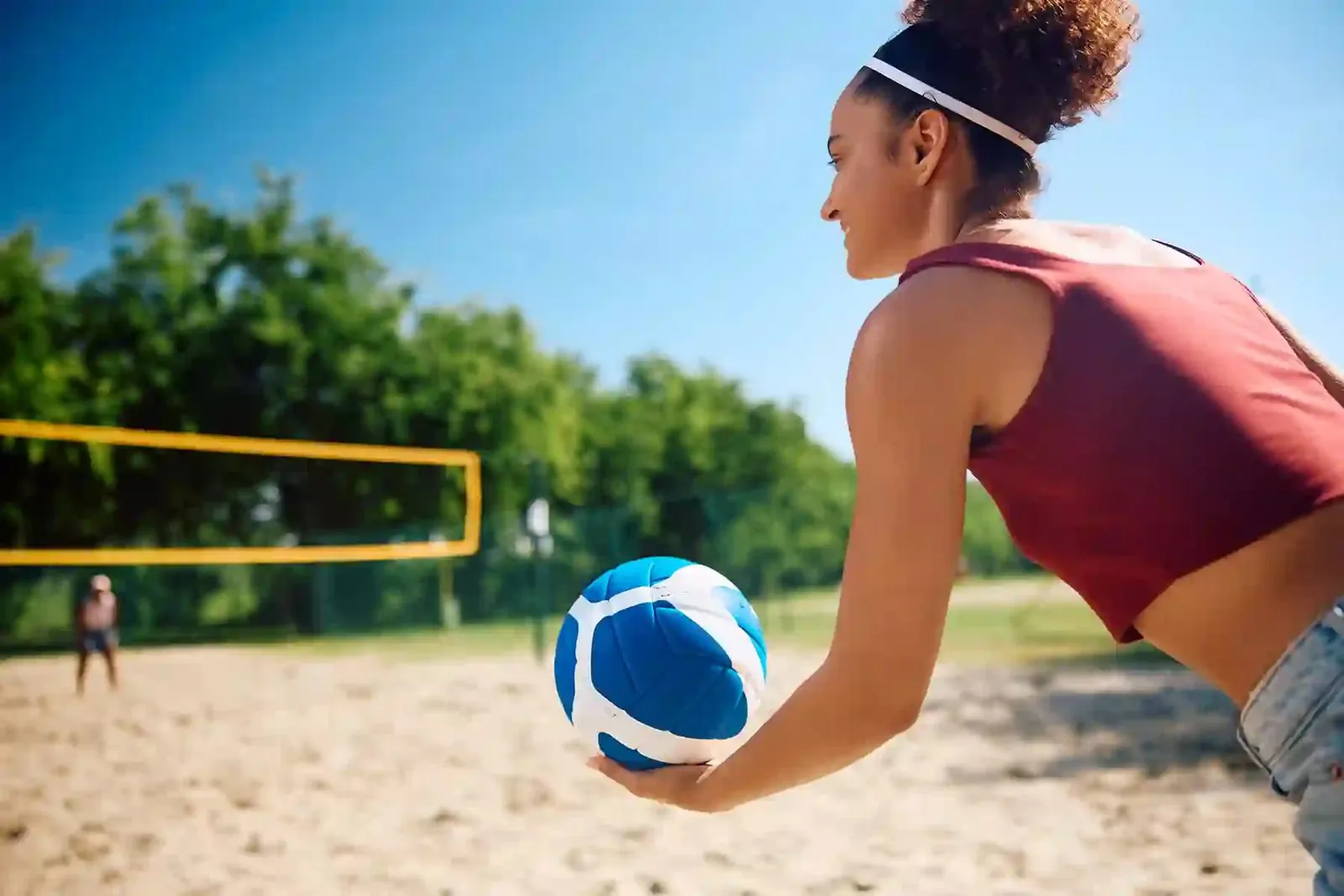 Woman playing beach volleyball