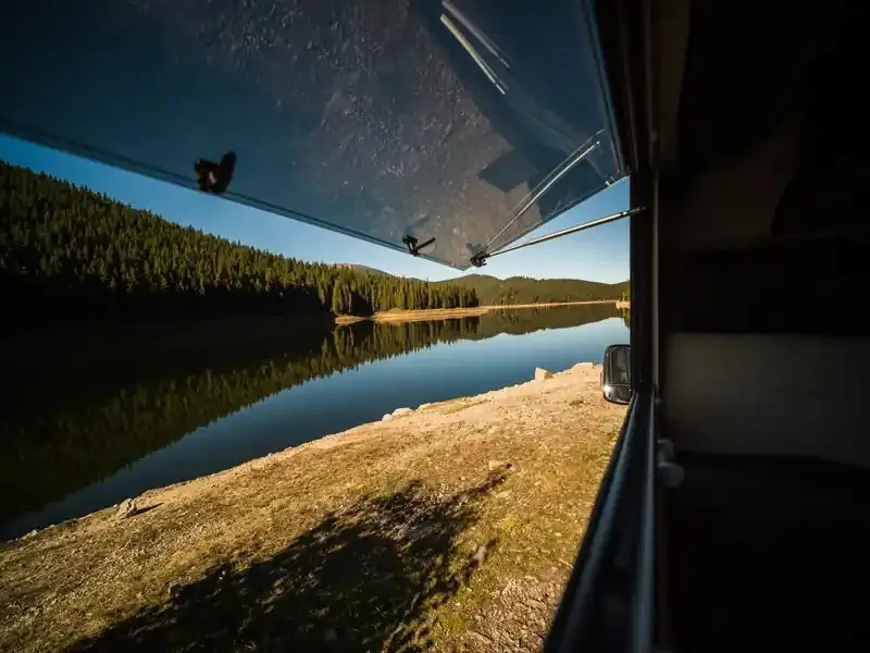 View of the lake from inside an RV window